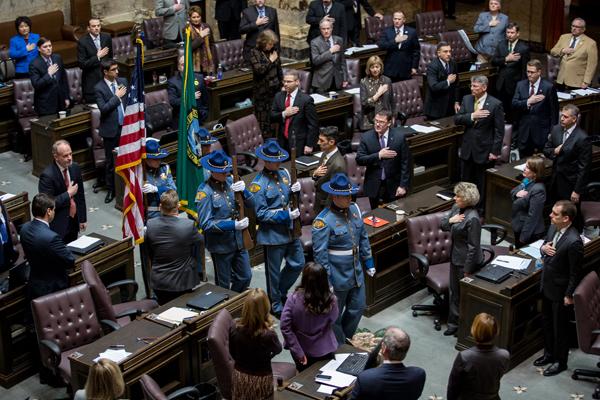 House members stand for flag salute 2014