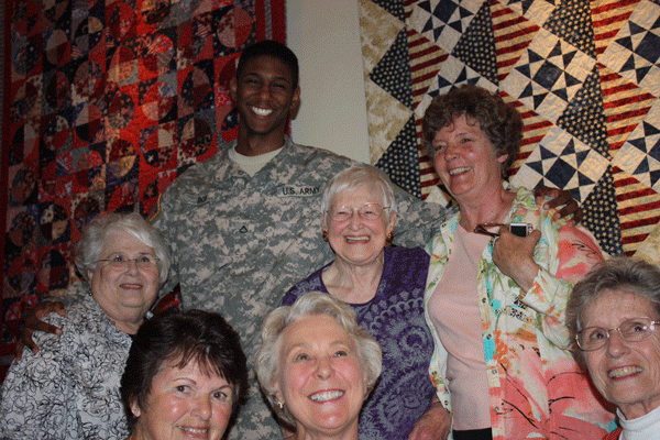Private-Box-&-quilters-at-Quilts-of-Valor-event