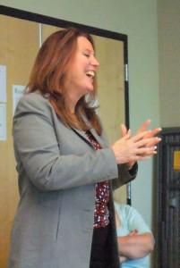 Kim Wyman addresses the library staff