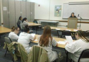 Thy Nguyen reads to WCCW inmates