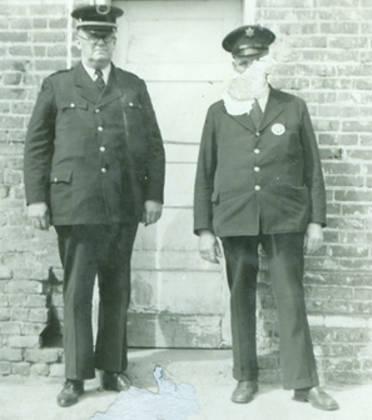 Night Officer William "Salty Bill" Edmondson (Left)
