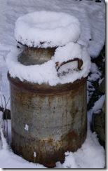Old snow-covered milk can--by Will Stuivenga